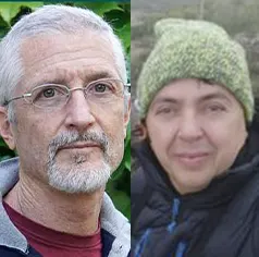Two adults side by side: a man with gray hair and glasses on the left, and a woman in a green knit hat on the right.